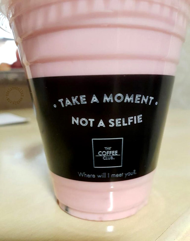 As seen at 'The Coffee Club' - "Take a moment, not a selfie" cup