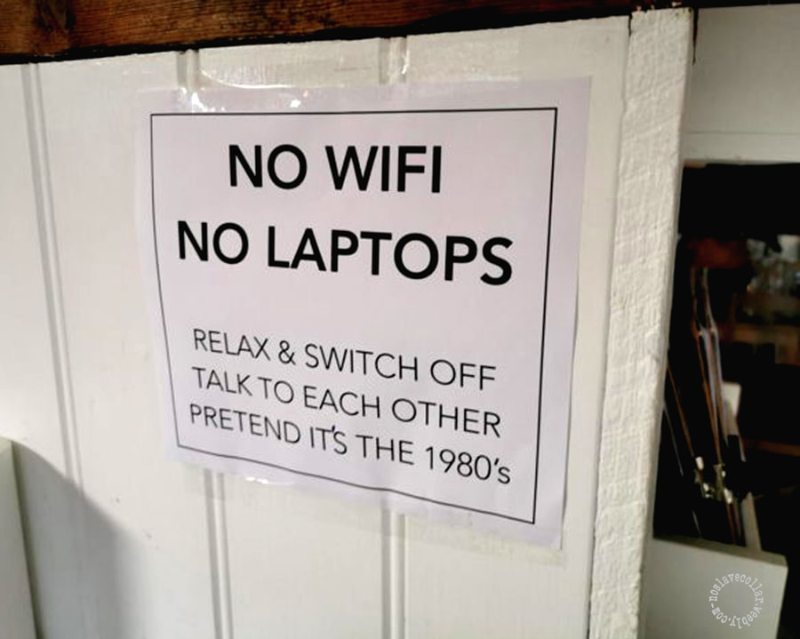 As seen at a trendy café: "No Wifi, No laptops, Relax and Switch off, Talk to each other, Pretend it's the 1980's"