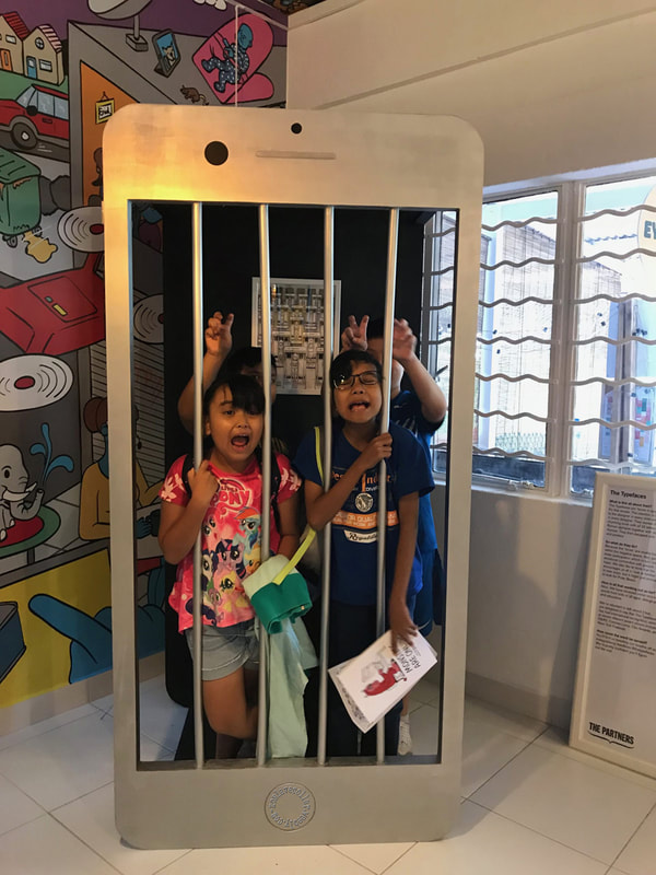 Children in a prison cell-phone