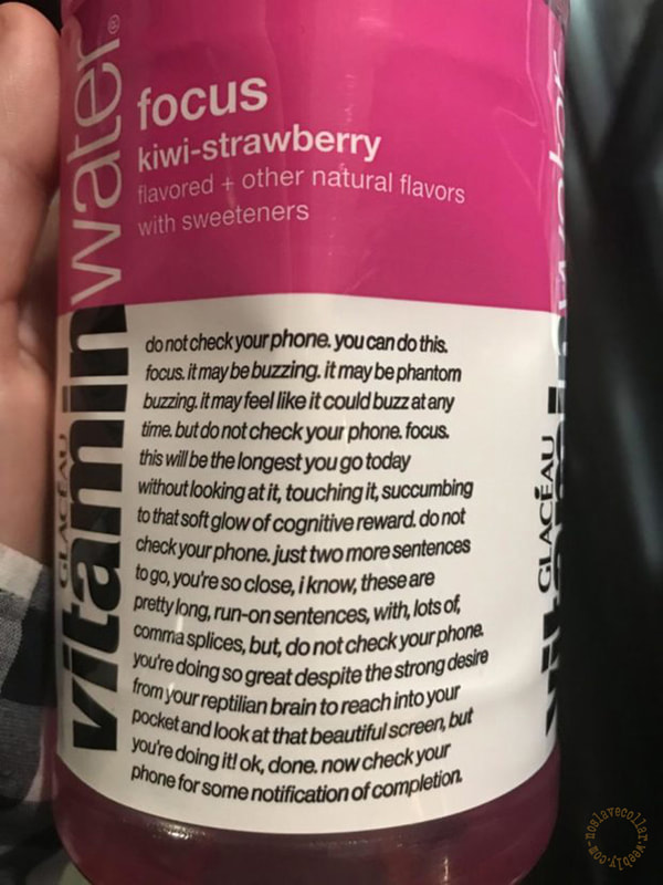 A vitamin water bottle - the text is there just to prevent the person who has this bottle from reaching for their phone, time to read the label!