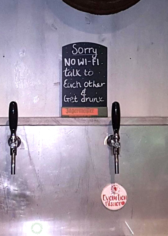 As seen in a Liverpool bar, UK - 'Sorry no Wi-Fi, talk to each other and get drunk' sign