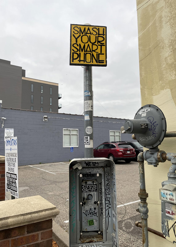 As seen on Nicolette (East Street ) in Minneapolis - 'Smash your Smart Phone' sign