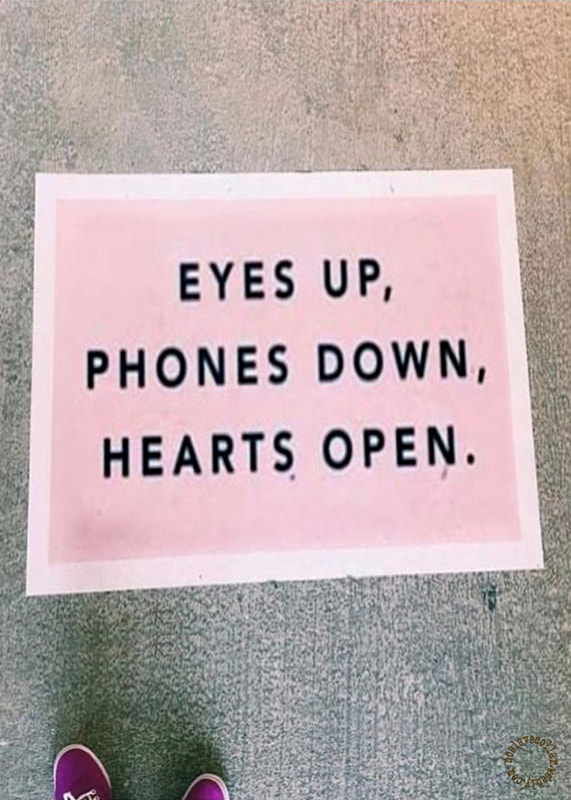'Eyes up, Phones down, Hearts open'