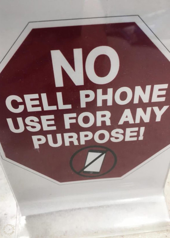 Found in a locker room - NO cell phone use for any purpose!