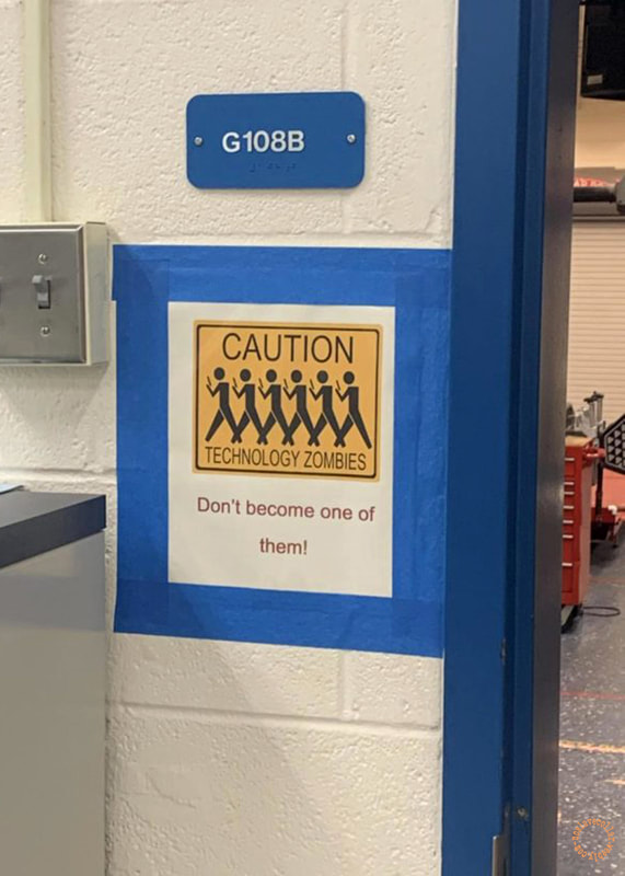 Found in an auto-tech class: "Caution. Technology zombies. Don't become one of them!"