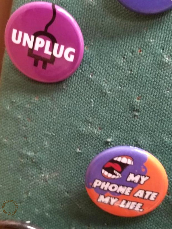 Found these pins at a board game store: "Unplug" and "My phone ate my life."