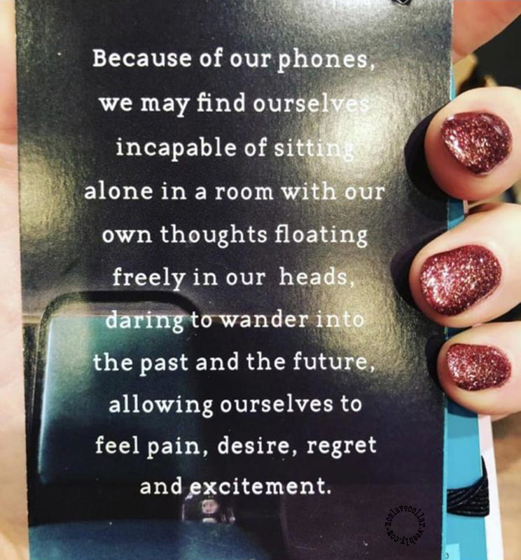On a notebook: "Because of our phones, we may find ourselves incapable of sitting alone in a room with our own thoughts floating freely in our heads, daring to wander into the past and the future, allowing ourselves to feel pain, desire, regret and excitement."