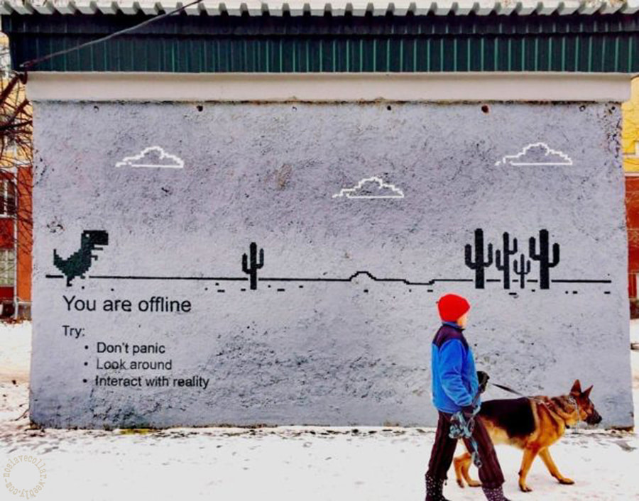 Wall art in Yekaterinburg, Russia, reading 'You are offline, Try not to panic, look around, interact with reality'