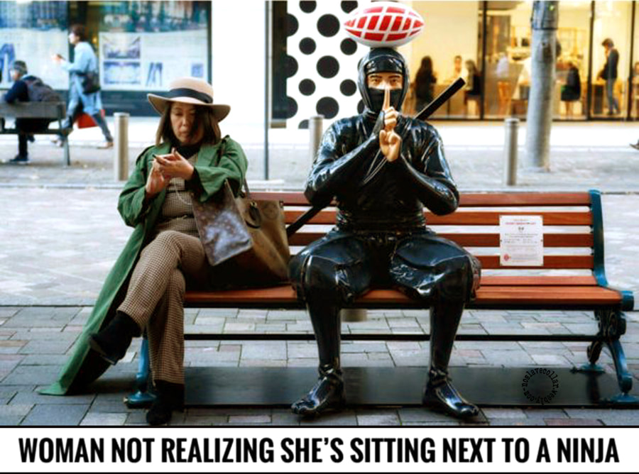 Woman not realizing she's sitting next to a Ninja